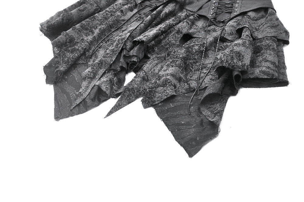 Gothic handkerchief hem skirt with faux leather waist and lace-up details, showcasing a dramatic, textured design.