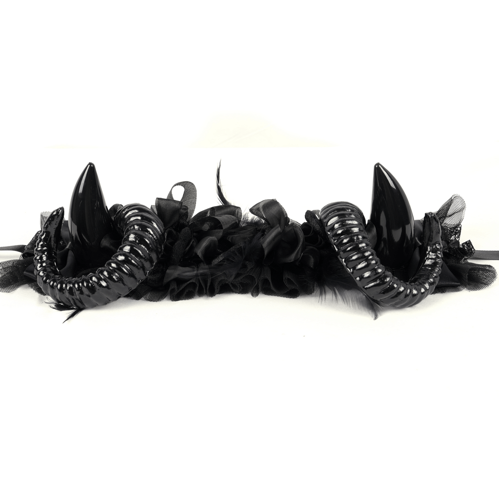 Gothic headpiece with curled black horns and floral accents, perfect for dark fashion enthusiasts.