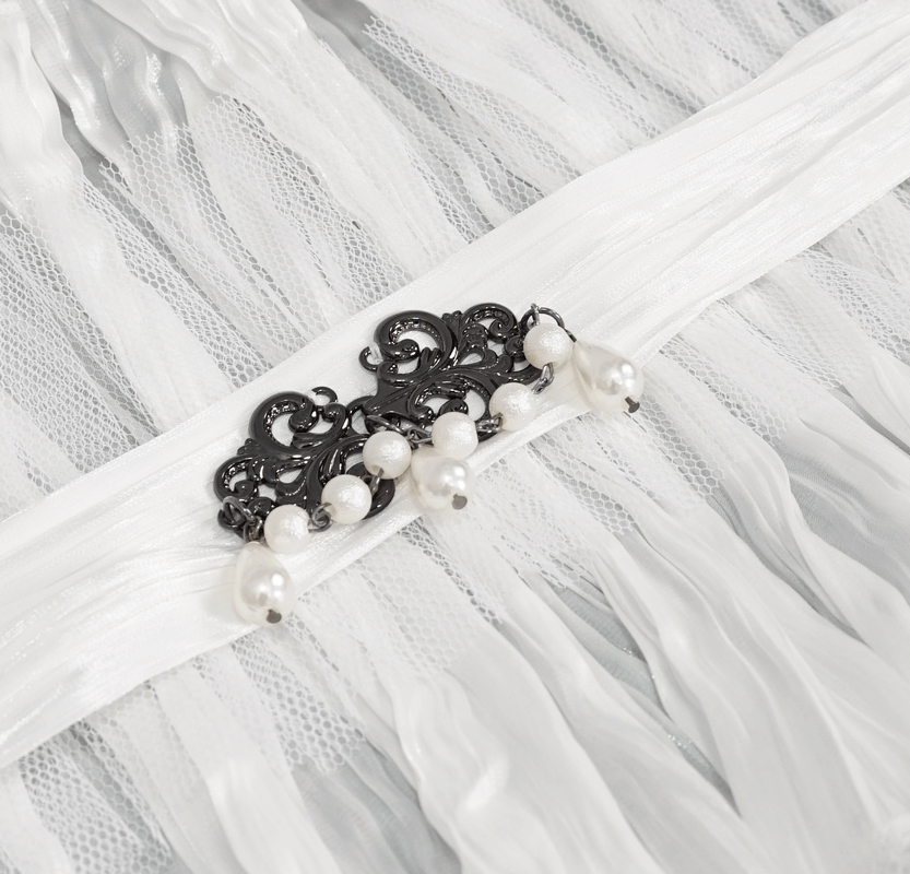 Gothic high collar featuring intricate black brooch with pearls on white lace fabric for a punk vintage look.