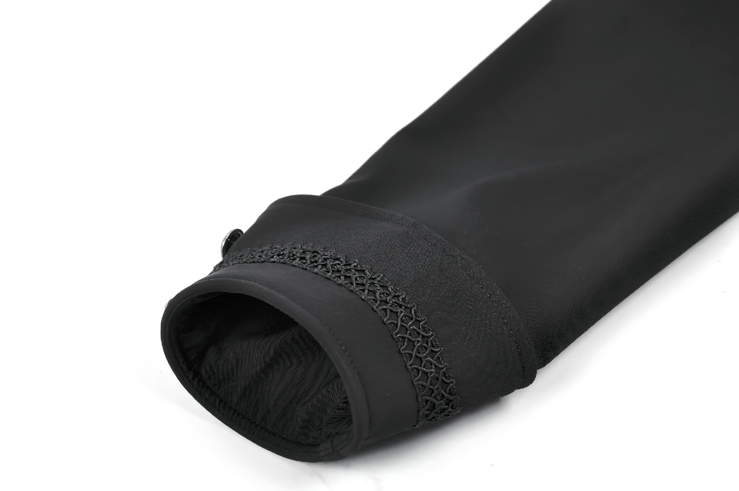 Close-up of the sleeve detail of the Gothic High Low Coat Dress with Cape and Silver Buttons, featuring intricate lace trim.