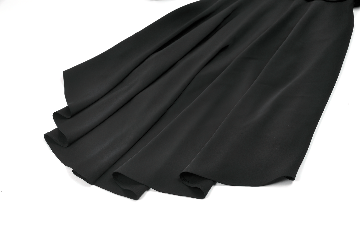 Gothic High Low Coat Dress with Cape and Silver Buttons showcasing the elegant black fabric and flared hem.