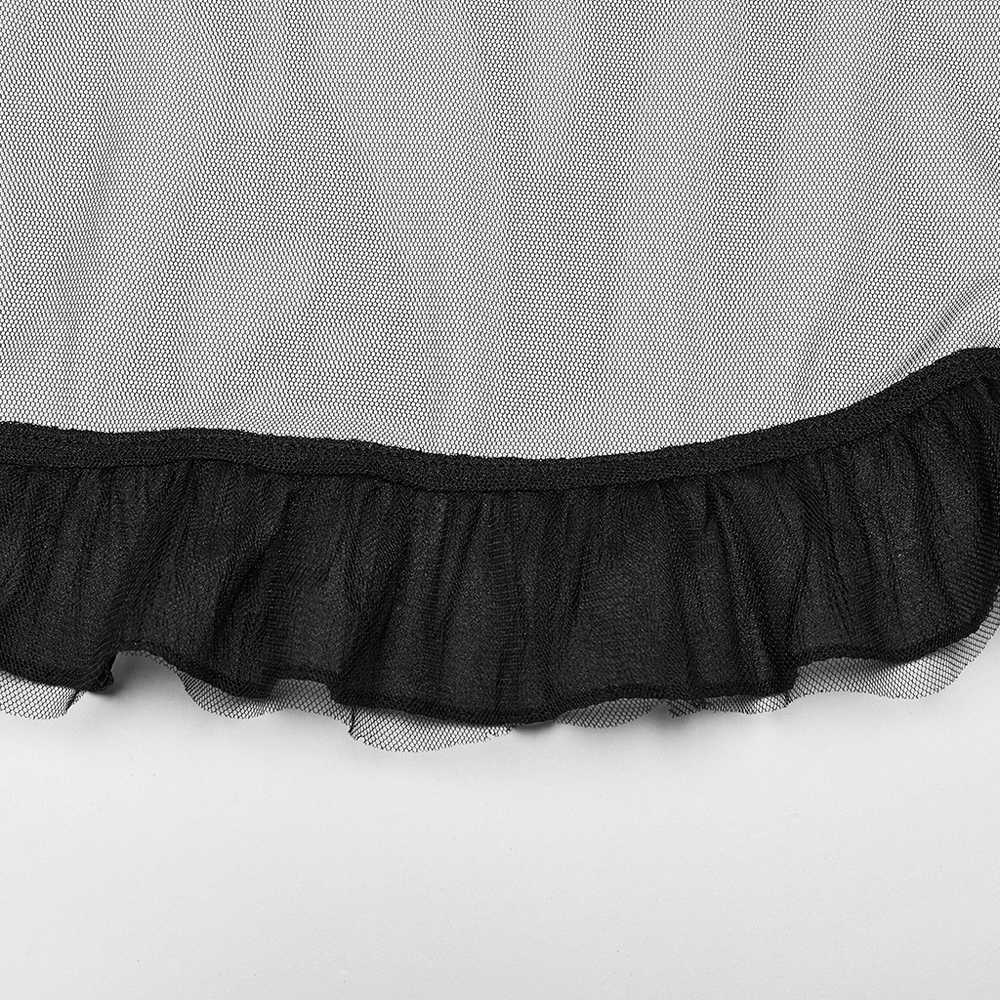 Close-up of the black ruffled trim on a sheer mesh fabric, showcasing gothic high-low skirt details.