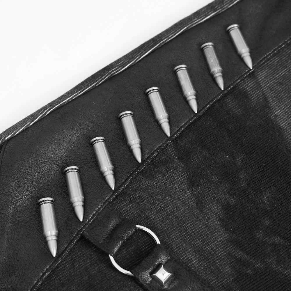 Close-up of edgy hardware details featuring metallic bullet accents on black fabric, perfect for alternative fashion.