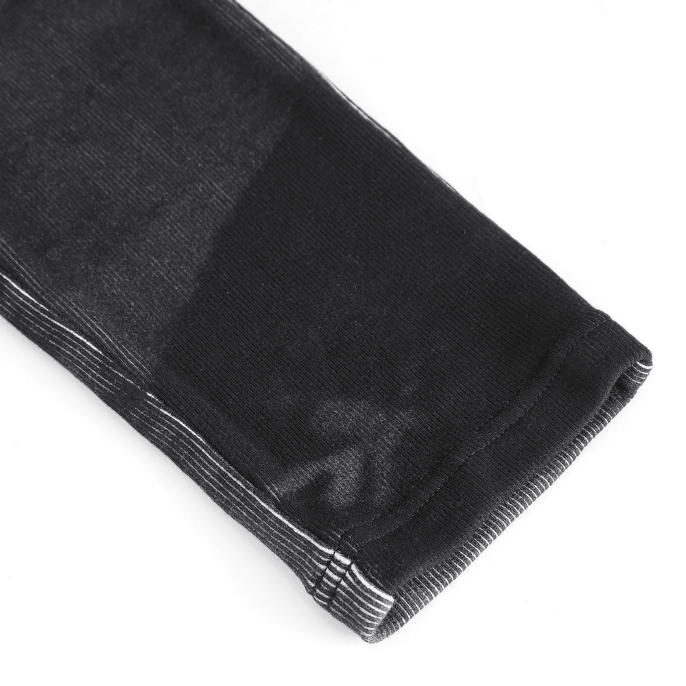 Close-up of Gothic high-waist lace-up pants showing intricate black fabric and stylish waistband detail.