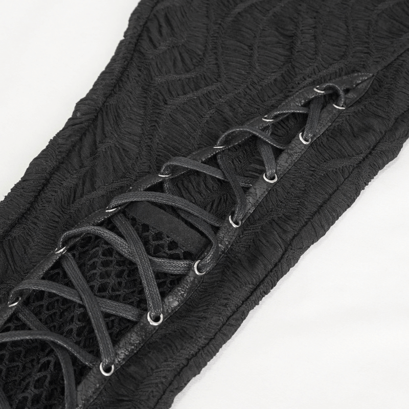 Close-up of gothic hollow out lace-up leggings showcasing mesh patchwork and intricate lace details.