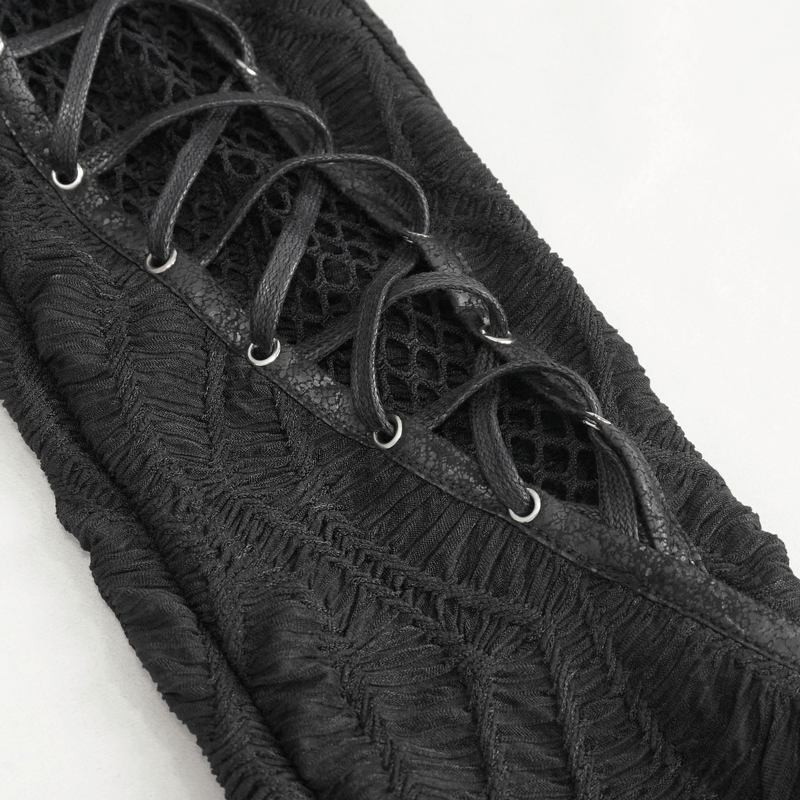 Close-up of Gothic lace-up leggings showcasing edgy mesh patchwork and intricate detailing.