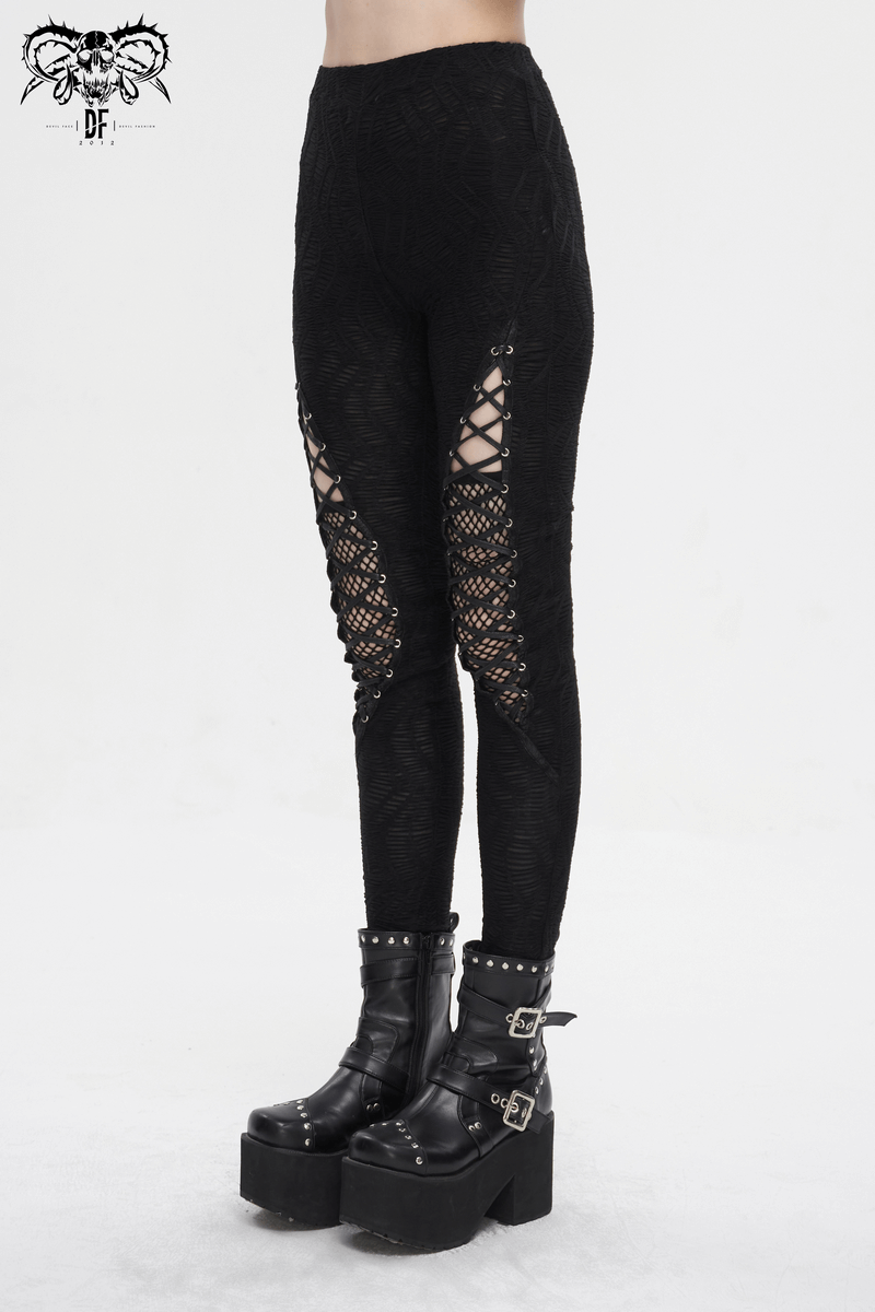 Gothic lace-up leggings with mesh patchwork and edgy design, paired with stylish chunky platform boots.