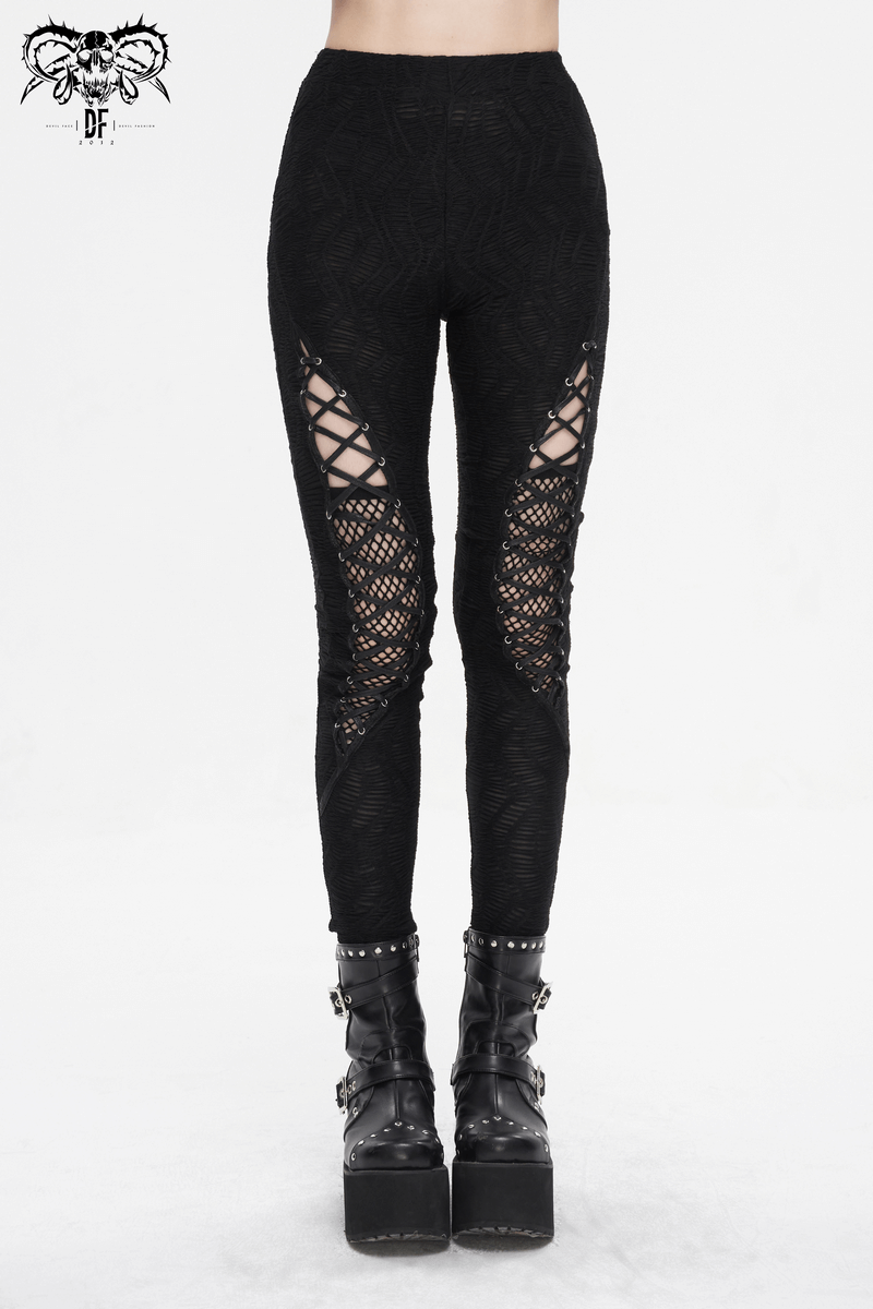 Gothic lace-up leggings with mesh patchwork, paired with stylish platform boots for edgy women's fashion.