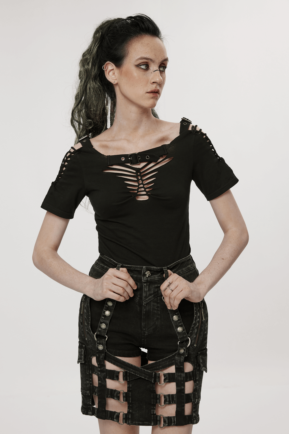 Gothic hollow-out woven t-shirt in black, paired with edgy denim shorts, showcasing punk streetwear style.