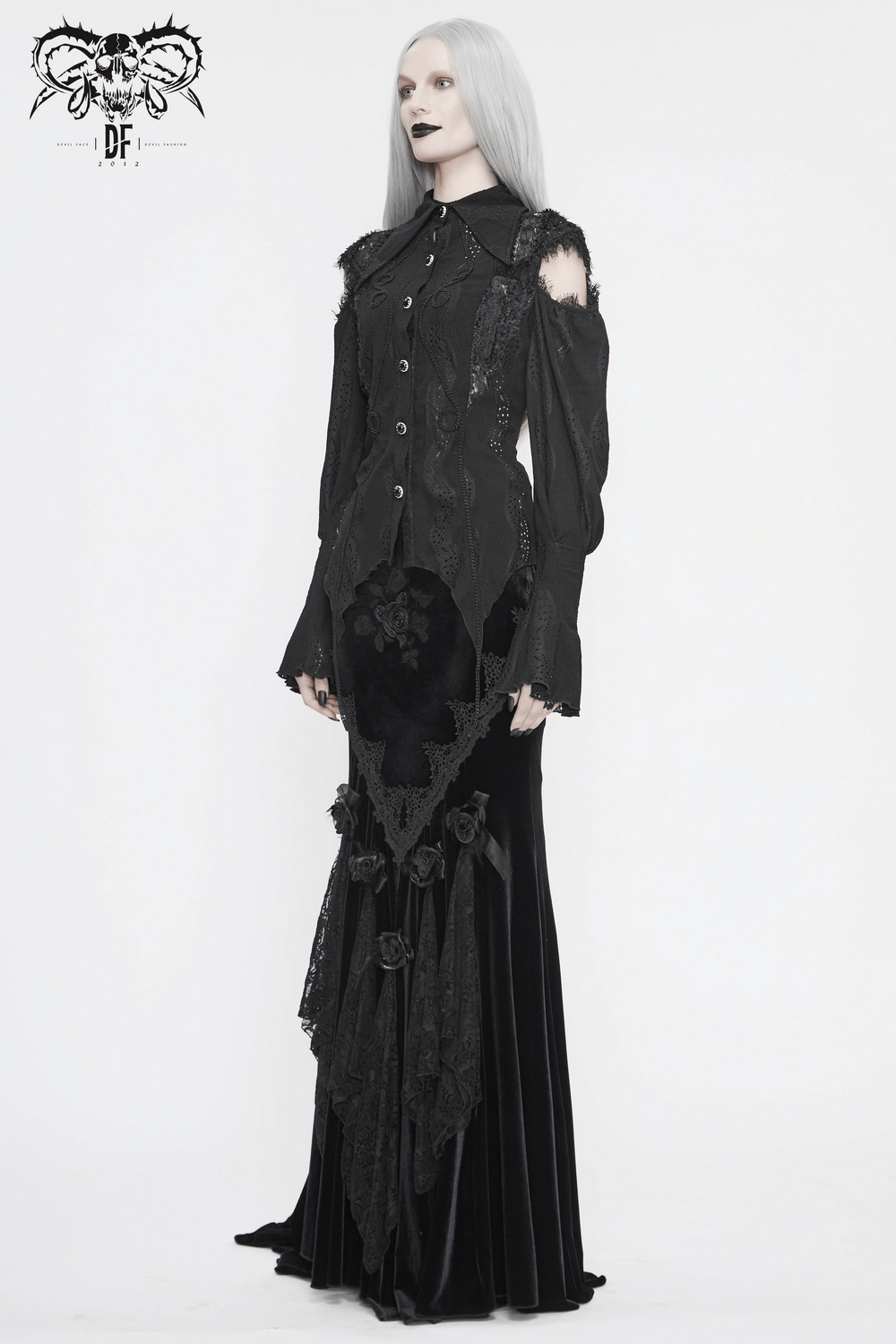 Gothic black blouse with lantern sleeves and lace detailing, perfect for vintage-inspired looks.