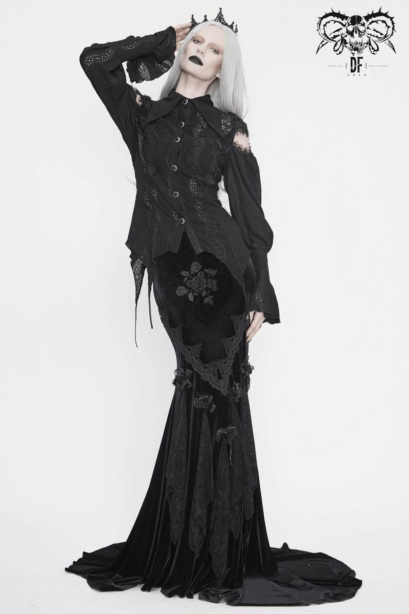 Gothic black blouse with lantern sleeves and lace details, styled with a dramatic long skirt for a vintage, elegant look.