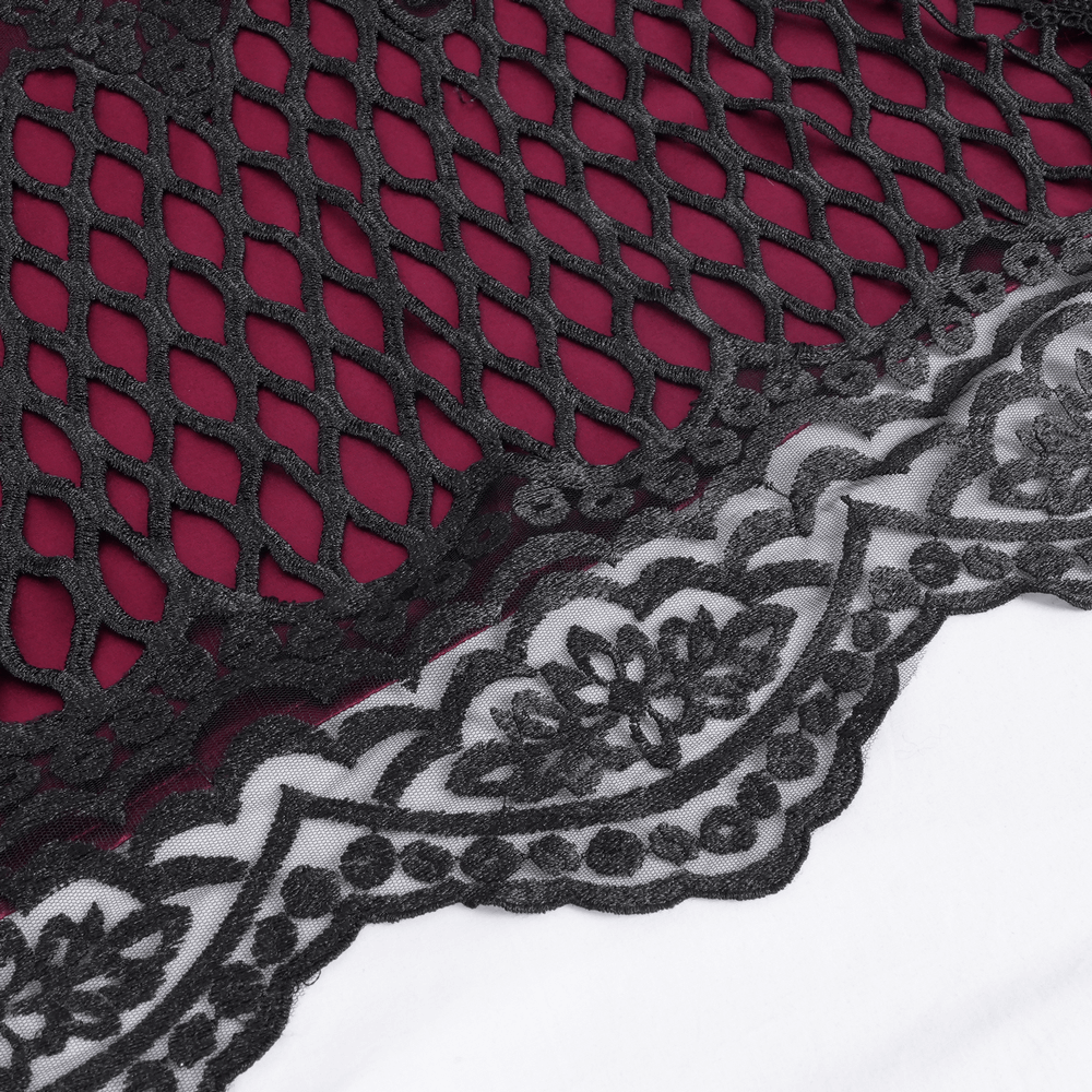 Close-up of rich satin fabric with intricate black lace and mesh detailing, perfect for a Gothic hooded cape.