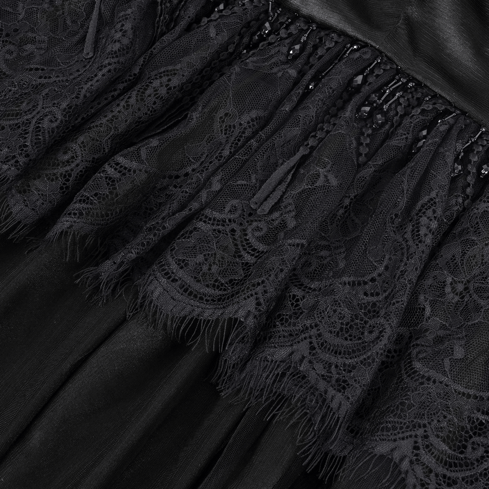 Intricate black lace embroidery on a gothic hooded cape with mesh details.