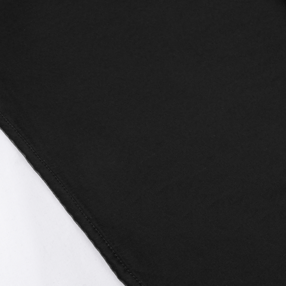 Close-up of a black fabric, showcasing smooth texture, ideal for gothic clothing like hooded capes.