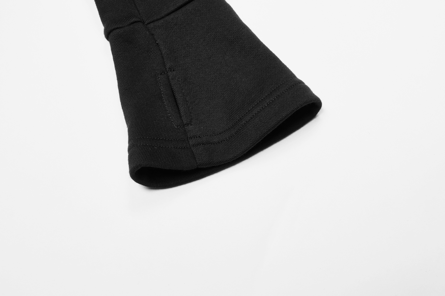 Close-up of gothic hooded sweater’s thumb-exposing black cuff, showcasing premium fabric and stylish design.
