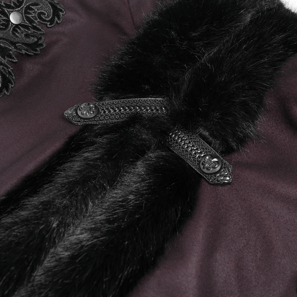 Close-up of gothic cloak's black fur trim and intricate detailing, showcasing dark elegance and dramatic design.