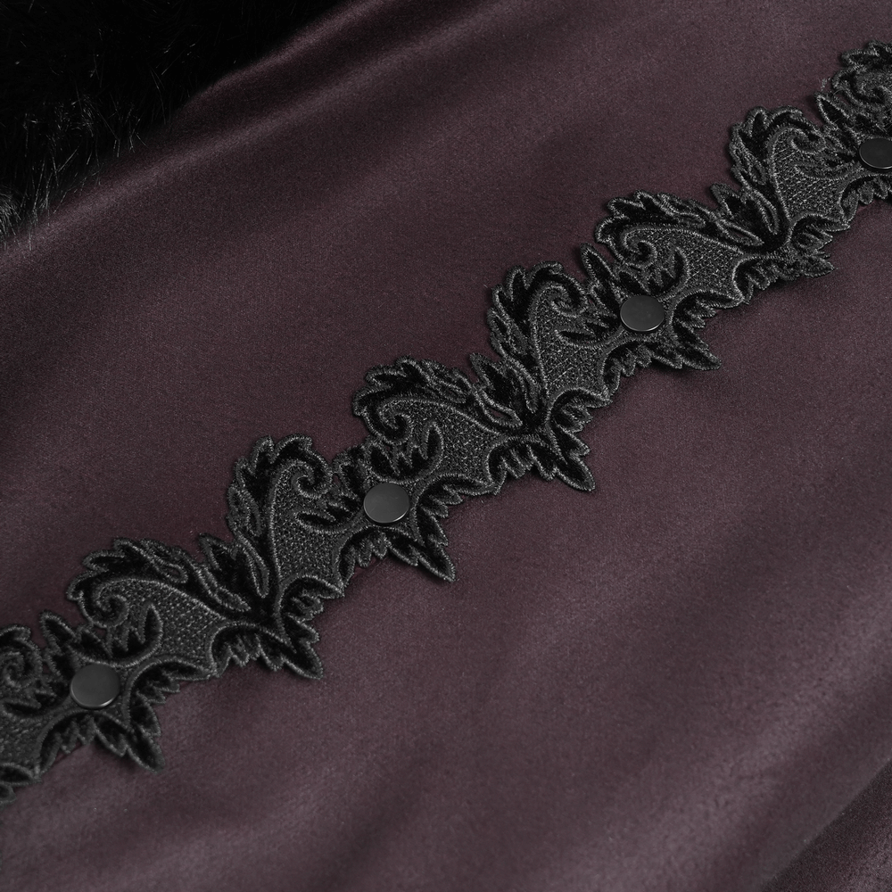 Close-up of embroidered detail on Gothic hooded cloak with fur trim, featuring decorative black buttons and rich dark fabric.