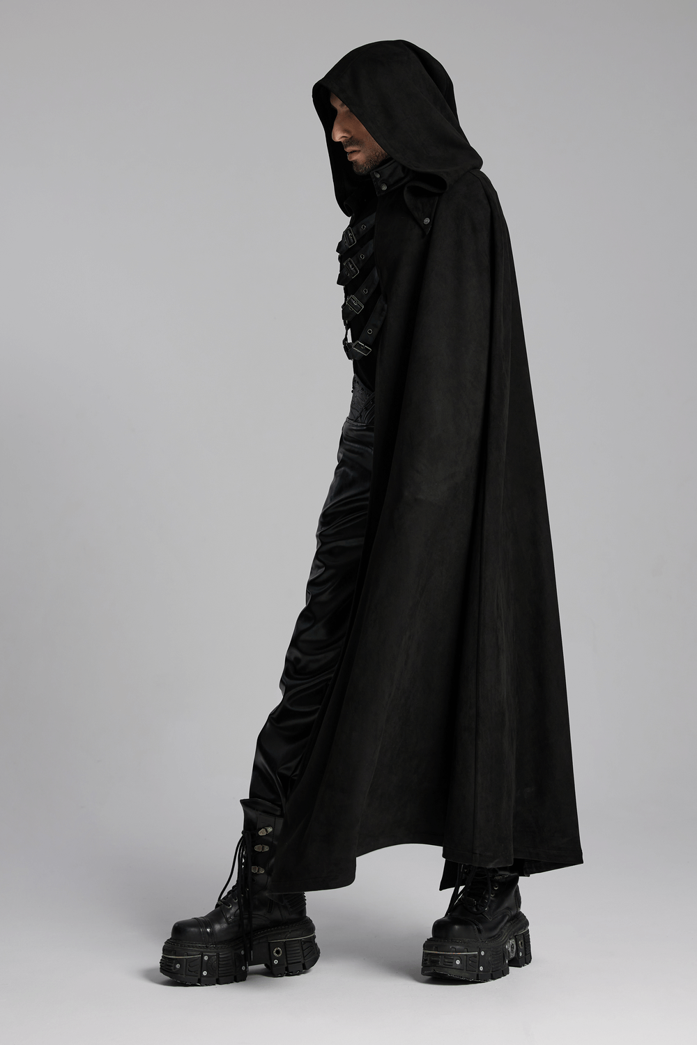 Gothic hooded half cape with asymmetric design, leather straps, and punk aesthetic, perfect for alternative fashion lovers.