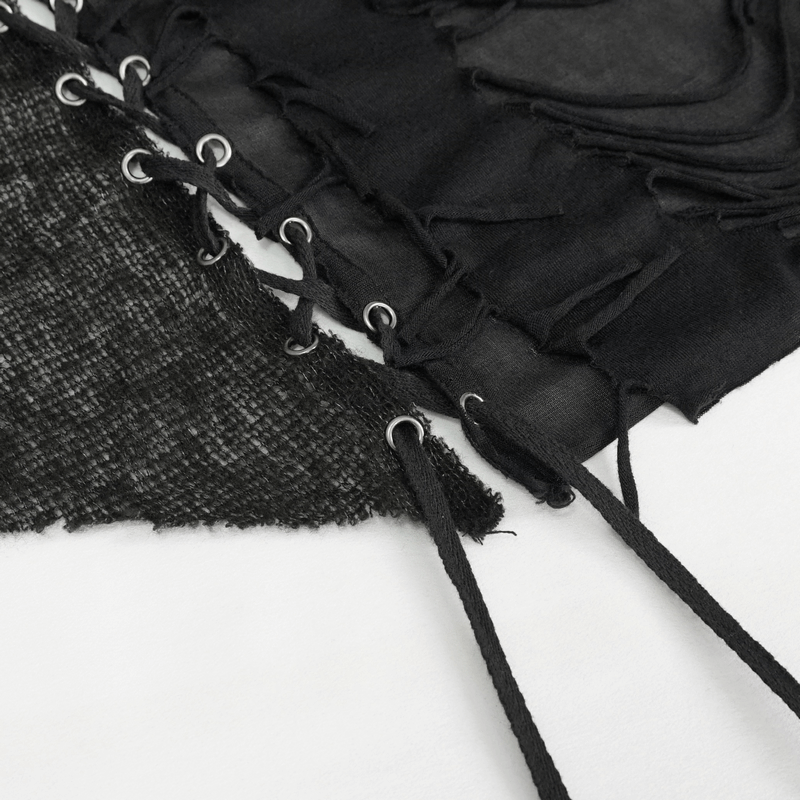Close-up of black gothic lace detailing with lacing on an asymmetric vest for women's costume style.