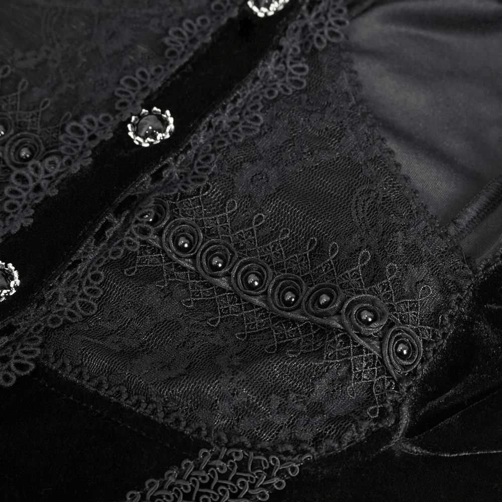 Close-up of gothic velvet top showcasing intricate lace details and buttons for a vintage-inspired look.