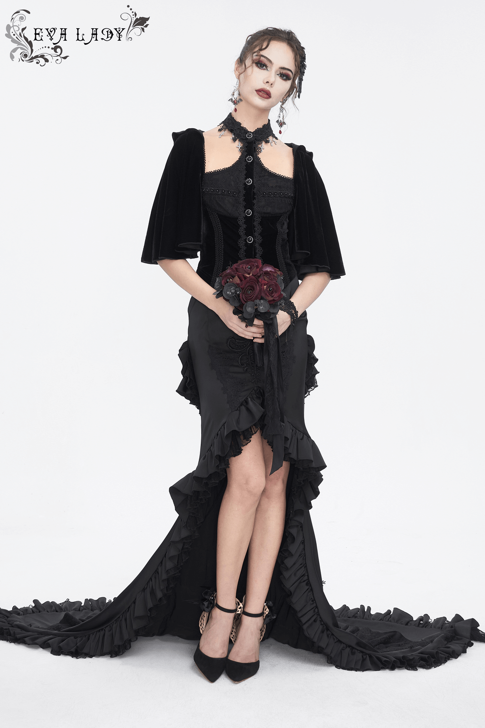Elegant gothic dress with velvet cape sleeves, lace details, and ruffled hem, perfect for dark fashion lovers.