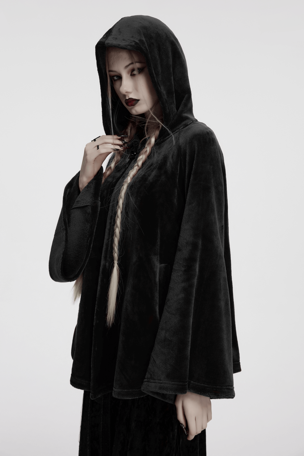 Gothic hooded velvet cape in black, perfect for witchy style and alternative fashion lovers.