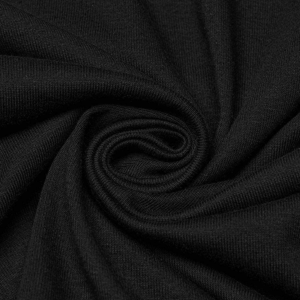 close-up of black elastic and mesh fabric swirl for gothic hooded vest design.