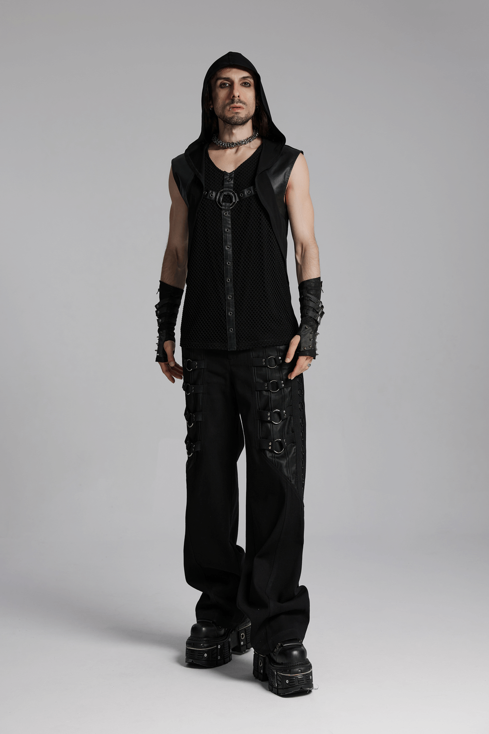 Gothic hooded vest with mesh details, metal accents, and wide shoulders, styled for an edgy punk look.