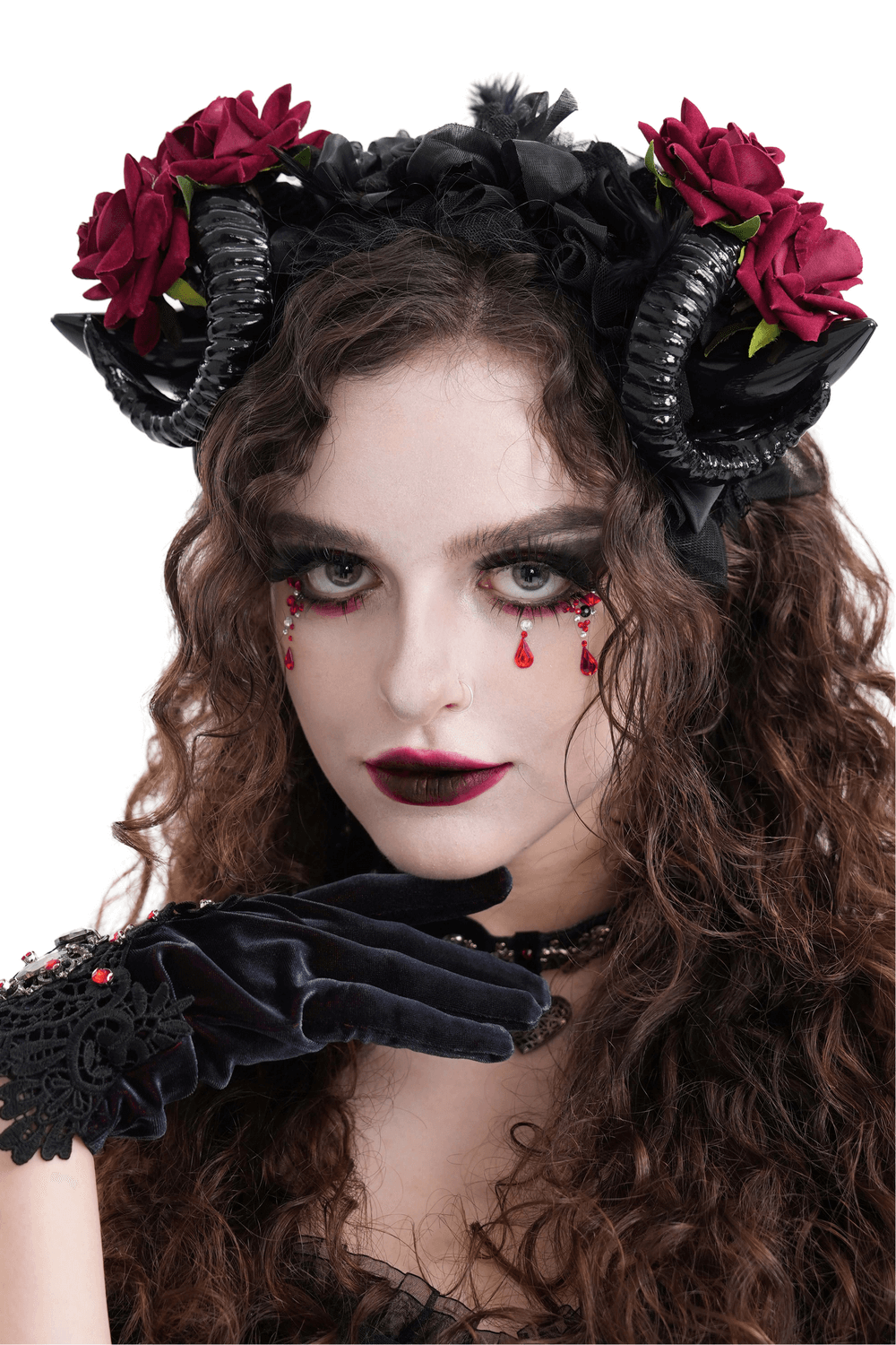 Gothic horned headpiece with red roses, black ribbon, and dark makeup for an edgy look.