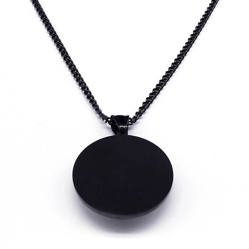 Gothic black pendant necklace with a sleek circular design on a chain, perfect for dark aesthetics and mystical styles.