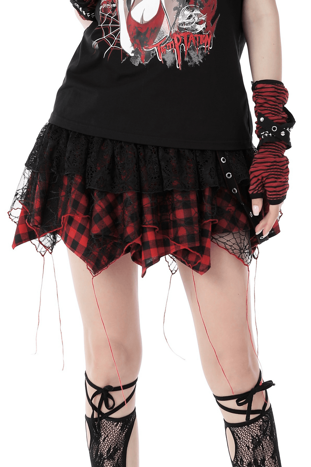 Gothic edgy layered mini skirt featuring plaid and lace details, perfect for punk rock style. Ideal for concerts and nights out.