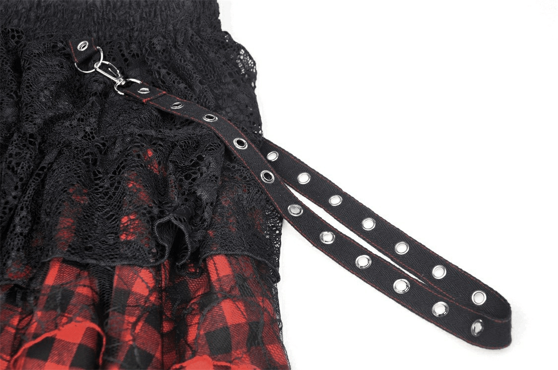 Close-up of gothic mini skirt featuring lace and plaid details with a stylish side chain strap.