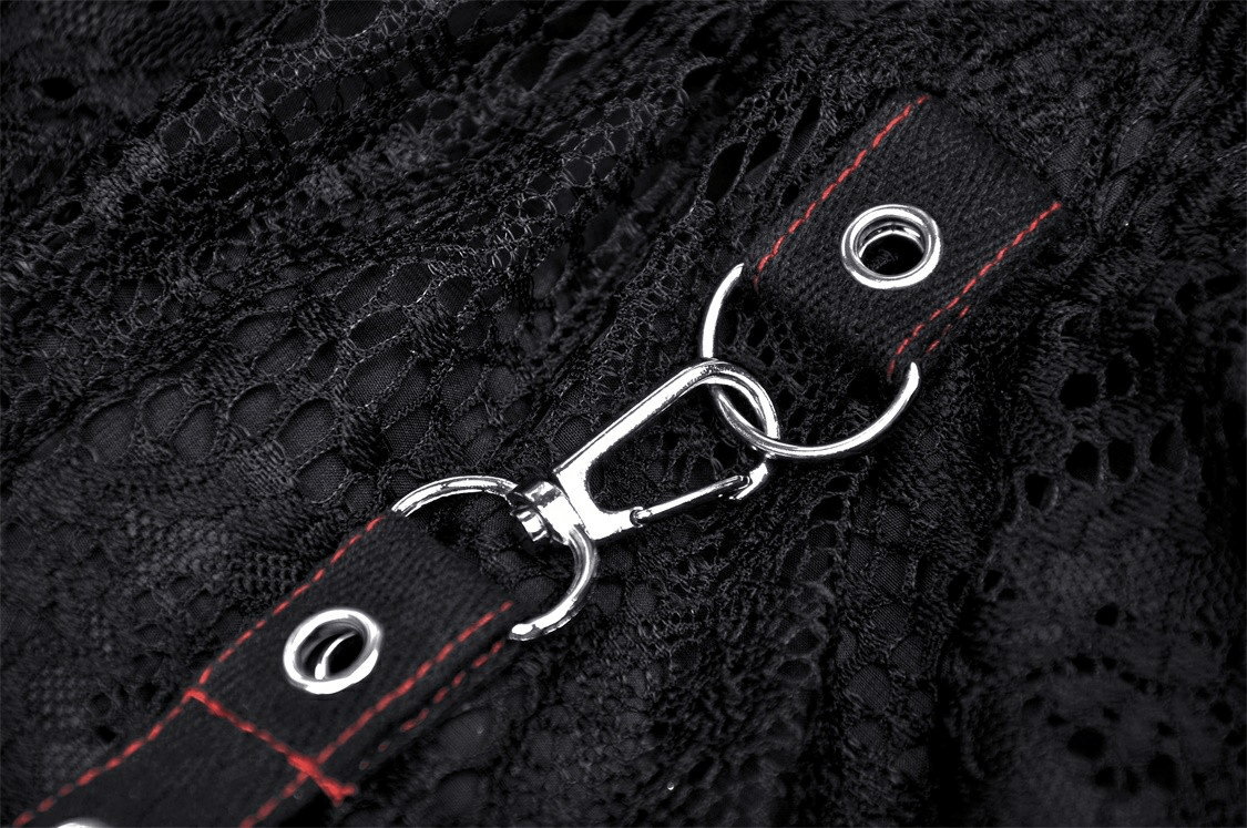 Close-up of the gothic layered skirt showing intricate lace detail and a stylish side chain accent.