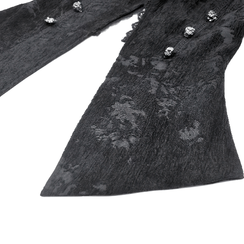 Close-up of gothic jacket sleeve showing lace trim and ornate skull buttons for a dramatic look.