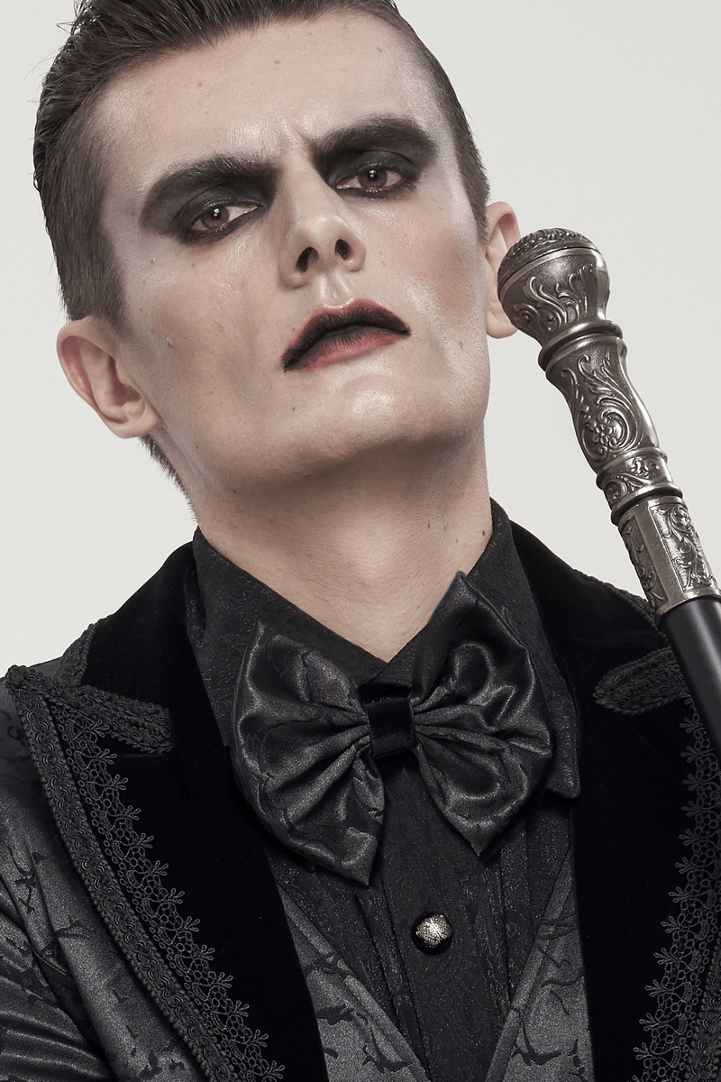 Gothic men's bow tie in black, elegant fashion accessory, paired with a stylish outfit and cane, perfect for gothic looks.