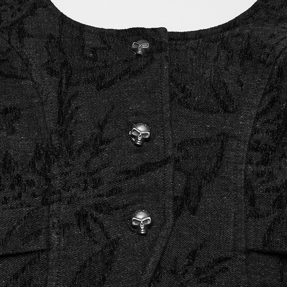 Close-up of Gothic Jacquard Denim Vest with skull buttons and textured fabric pattern.