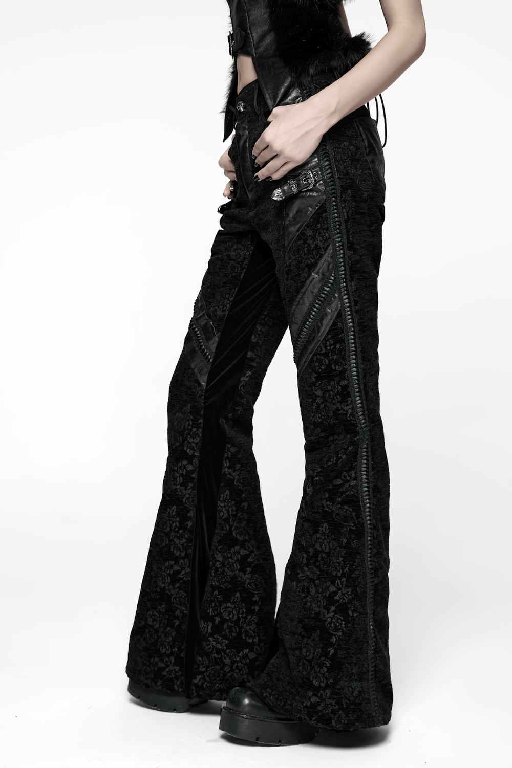 Gothic Jacquard Flared Pants with Faux Leather Details showcased with intricate rose pattern and striking webbing.