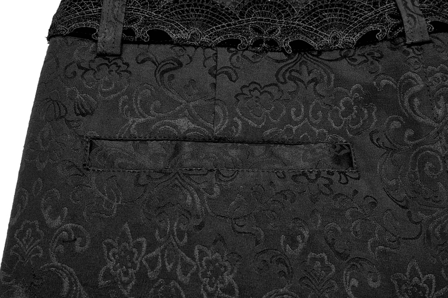 Elegant black jacquard lace pants showcasing intricate floral patterns and a stylish pocket detail.