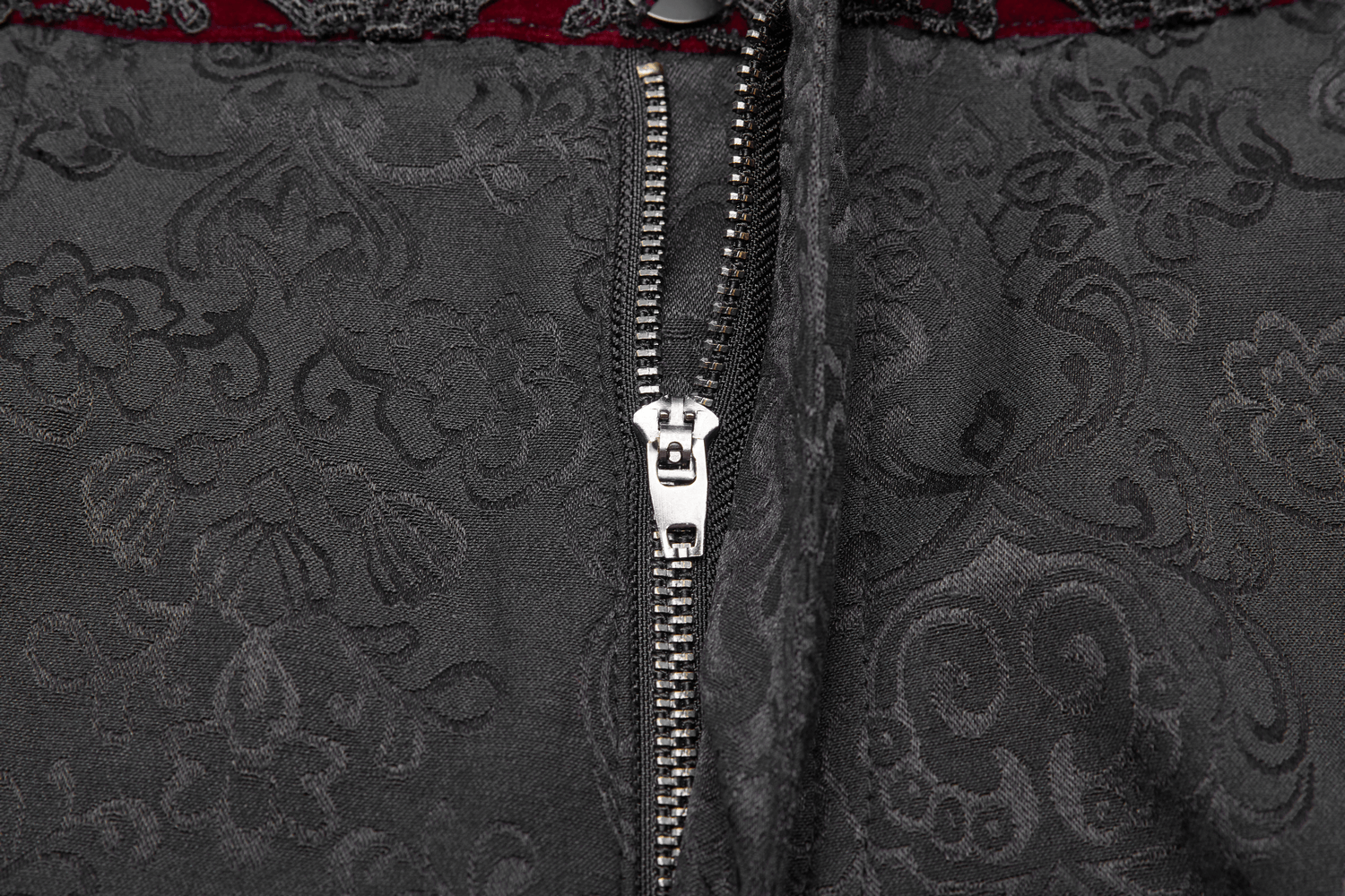 Close-up of Gothic Jacquard pants zipper and lace detail, showcasing elegant Victorian style.