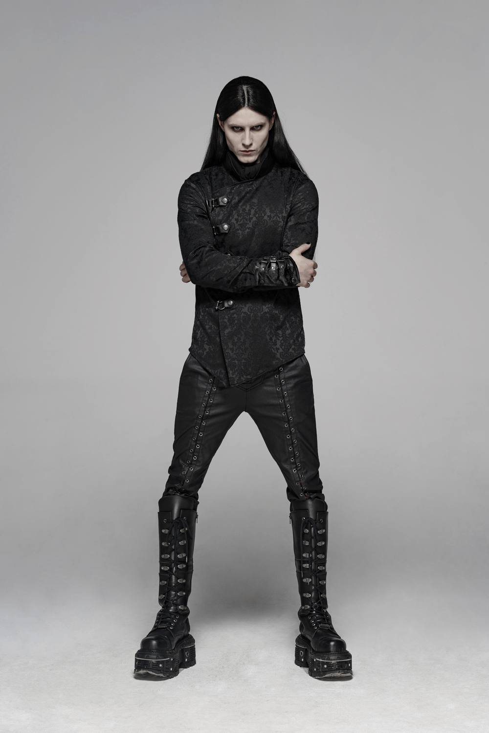 Avant-garde gothic jacquard shirt with leather buckles worn by a model, showcasing punk-inspired fashion.