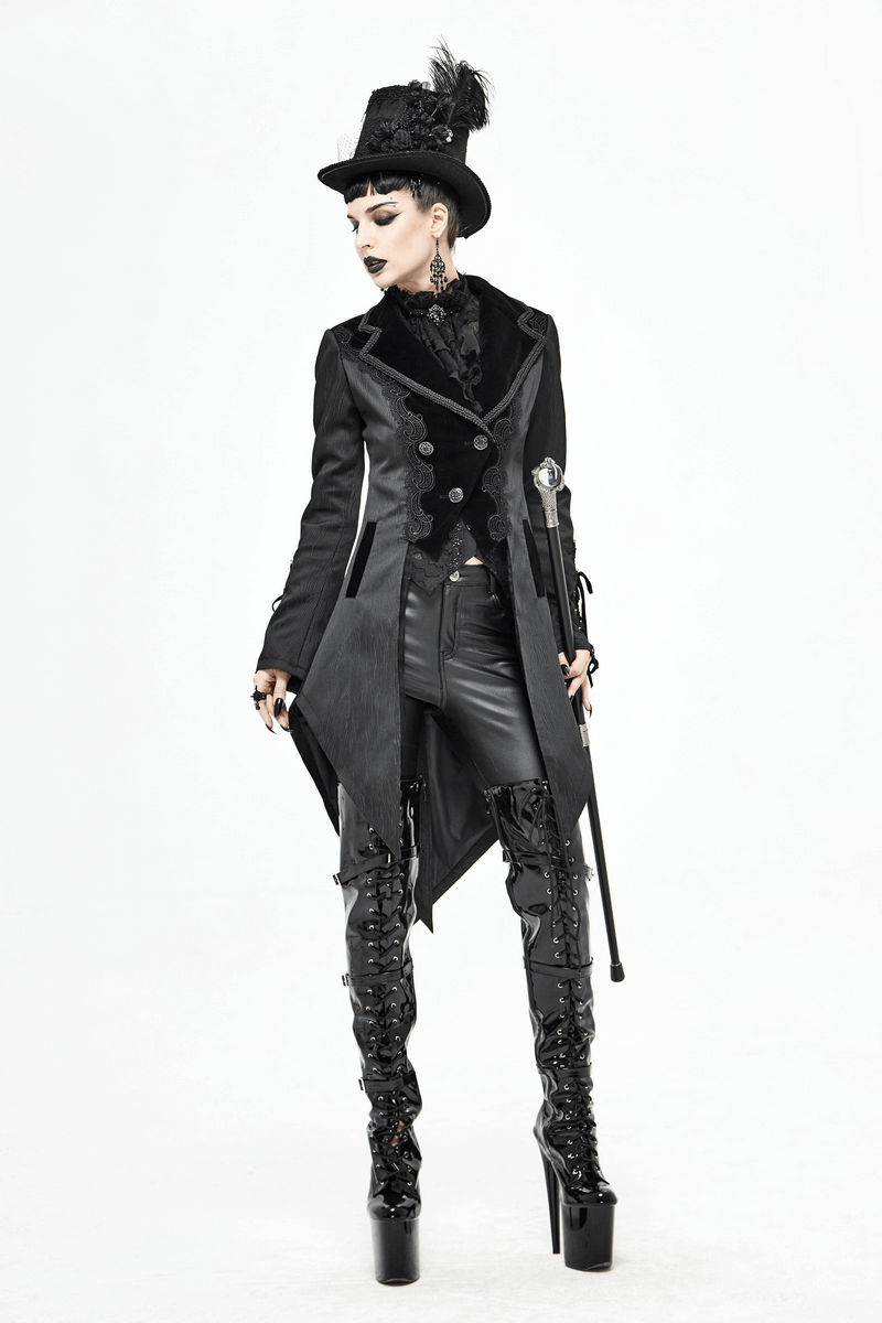 Gothic model in a stylish black swallow-tailed coat with lace inserts, silver buttons, and a vintage vibe.