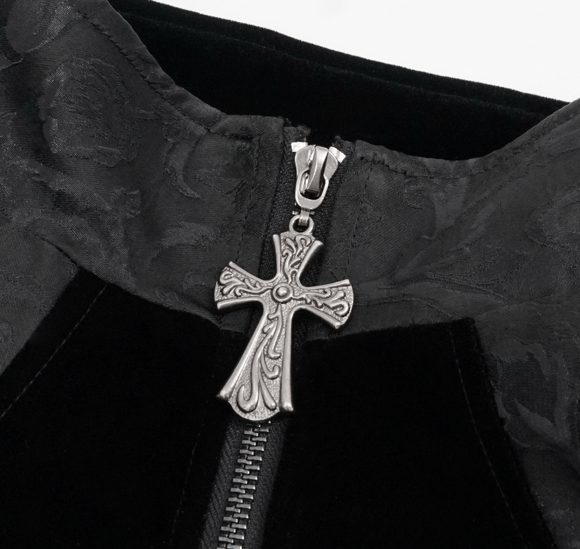 Close-up of the silver cross zipper pull on a gothic jacquard velvet coat, showcasing intricate detailing.