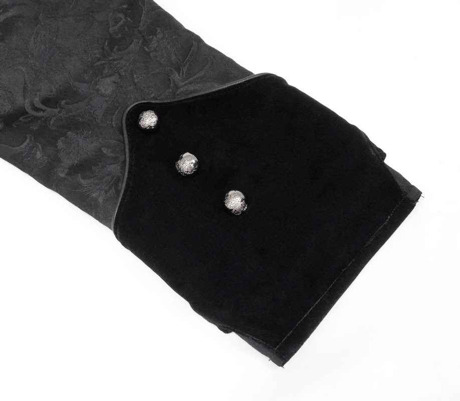Close-up of the stylish cuff of a Gothic jacquard velvet swallow tailcoat featuring silver button details.