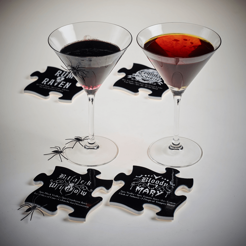 Gothic jigsaw coasters with cocktail recipes, Bloody Mary and Black Widow, paired with spooky drinks for Halloween parties.
