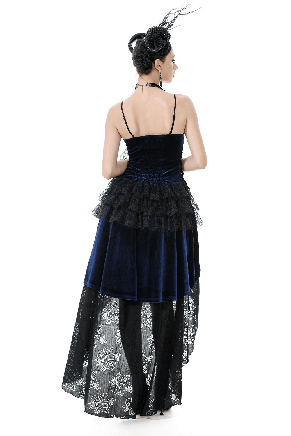 Back view of an elegant gothic lace and chain corset dress with ruffled skirt in rich velvet and lace details.
