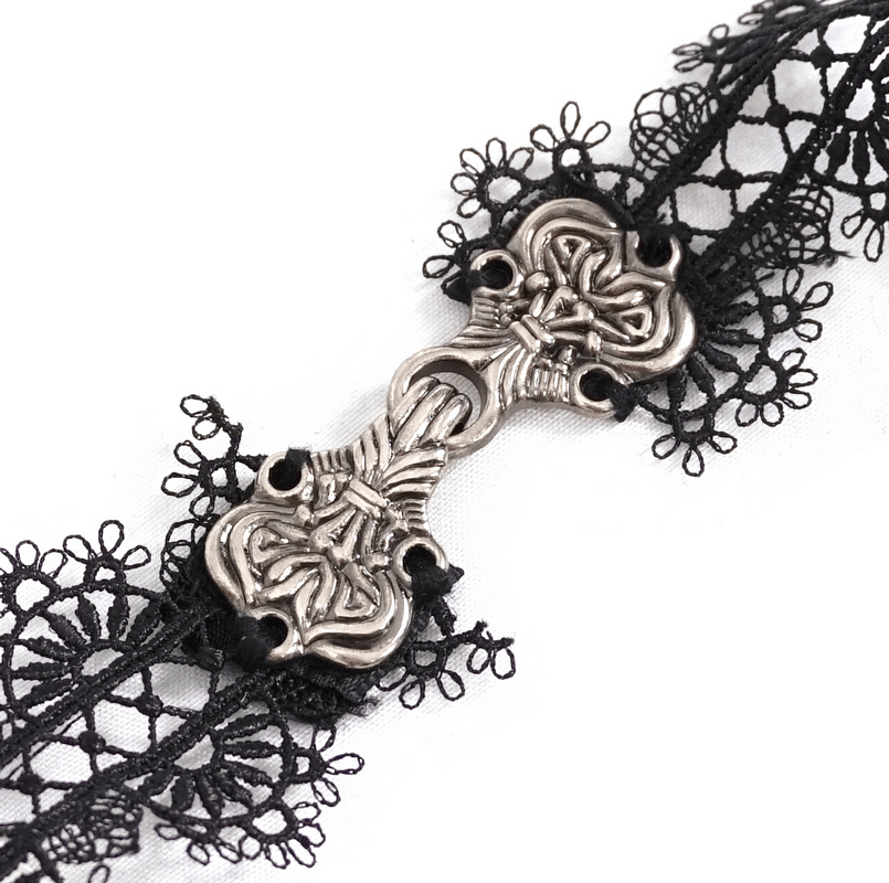 Close-up of a black lace choker with intricate silver clasp, perfect gothic fashion accessory for women.