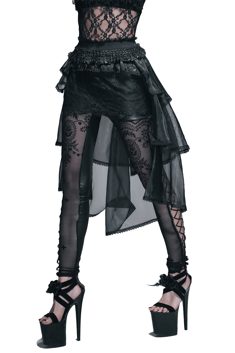 Punk-style black lace asymmetrical skirt with layered design, worn with strappy high heels for a bold look.