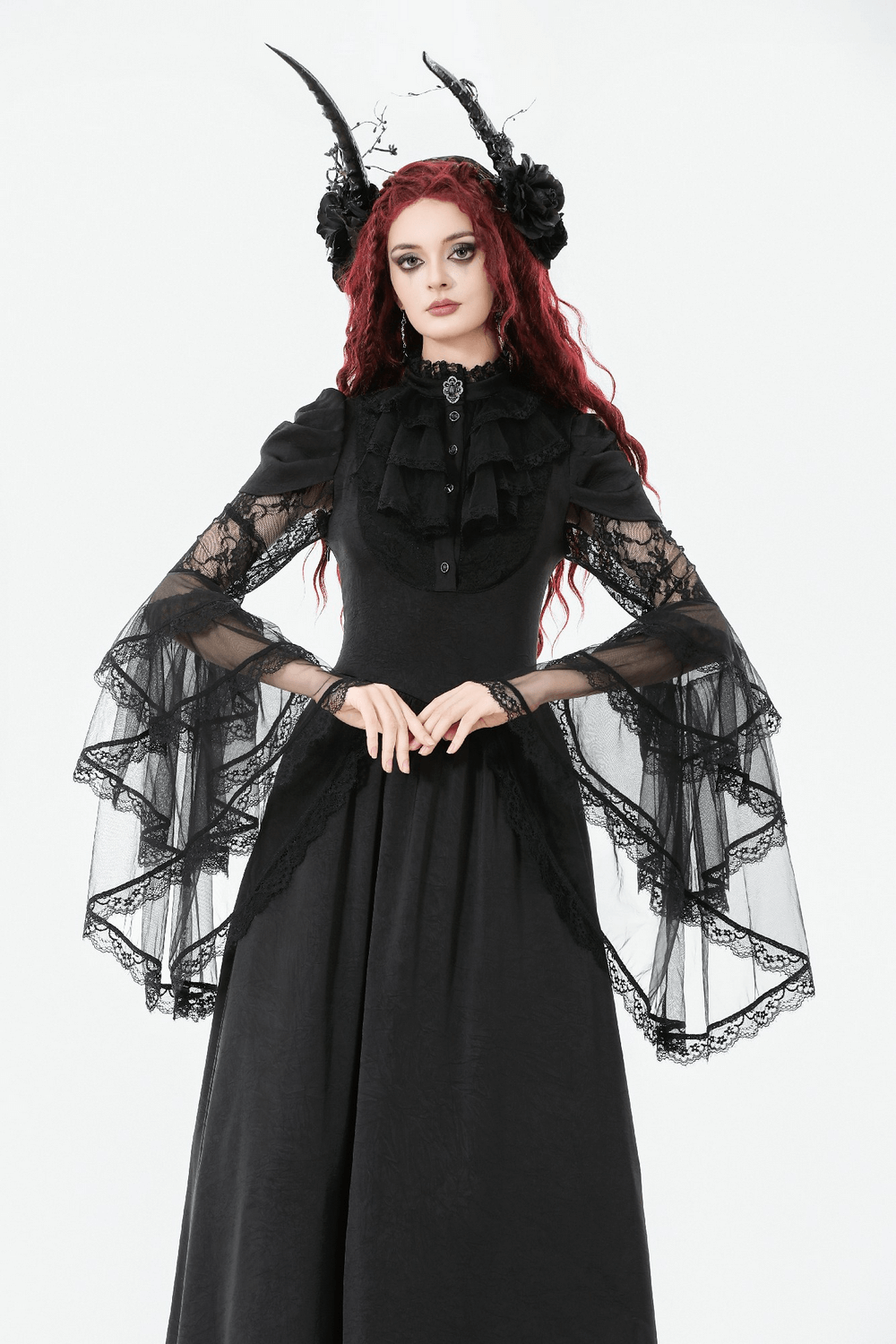 Gothic Lace Bell-Sleeve Black Dress with Corset Back worn by a model, featuring ruffled sleeves and a high-neck collar.