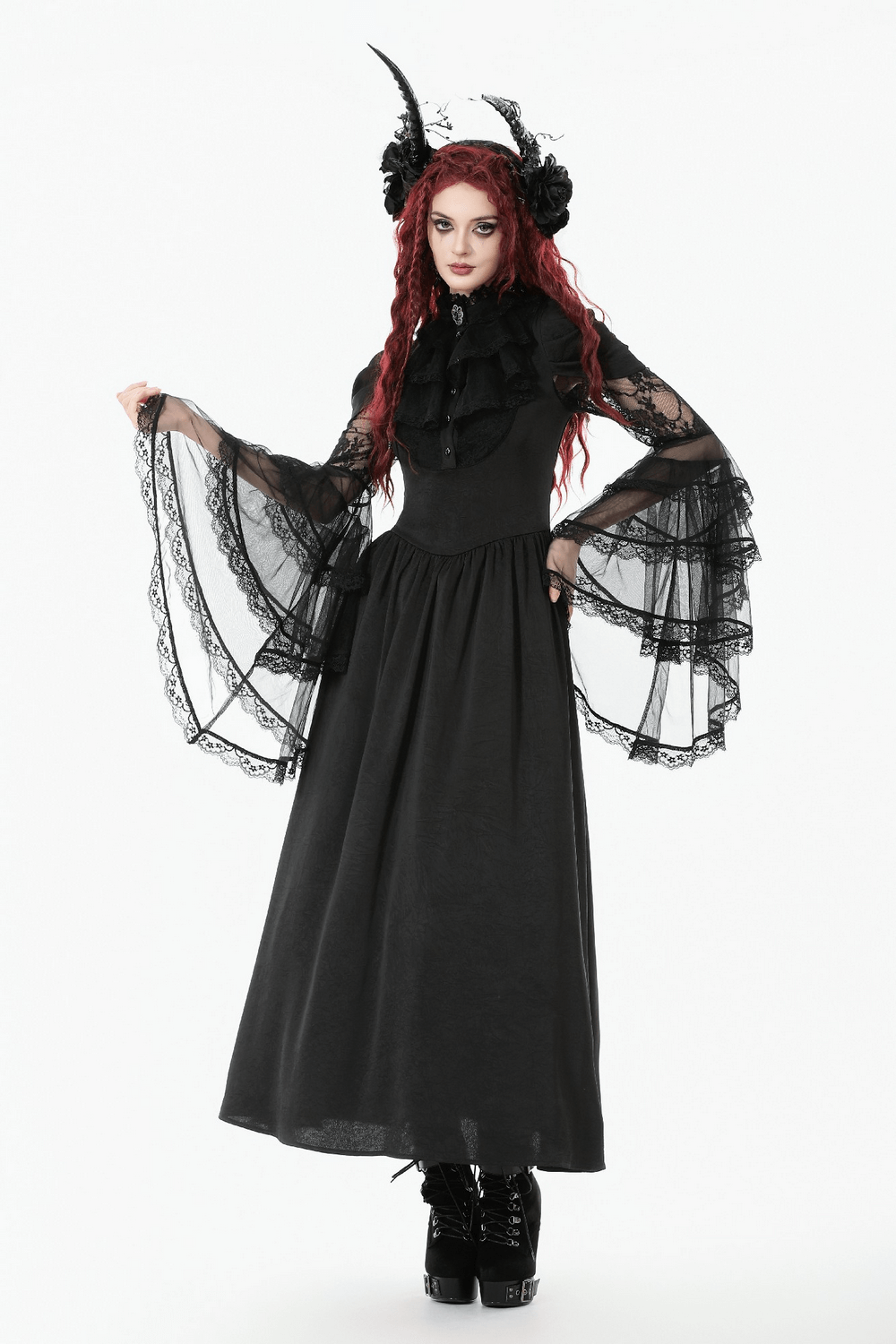 Gothic Lace Bell-Sleeve Black Dress with Corset Back worn by model with red hair and ruffled sleeves.