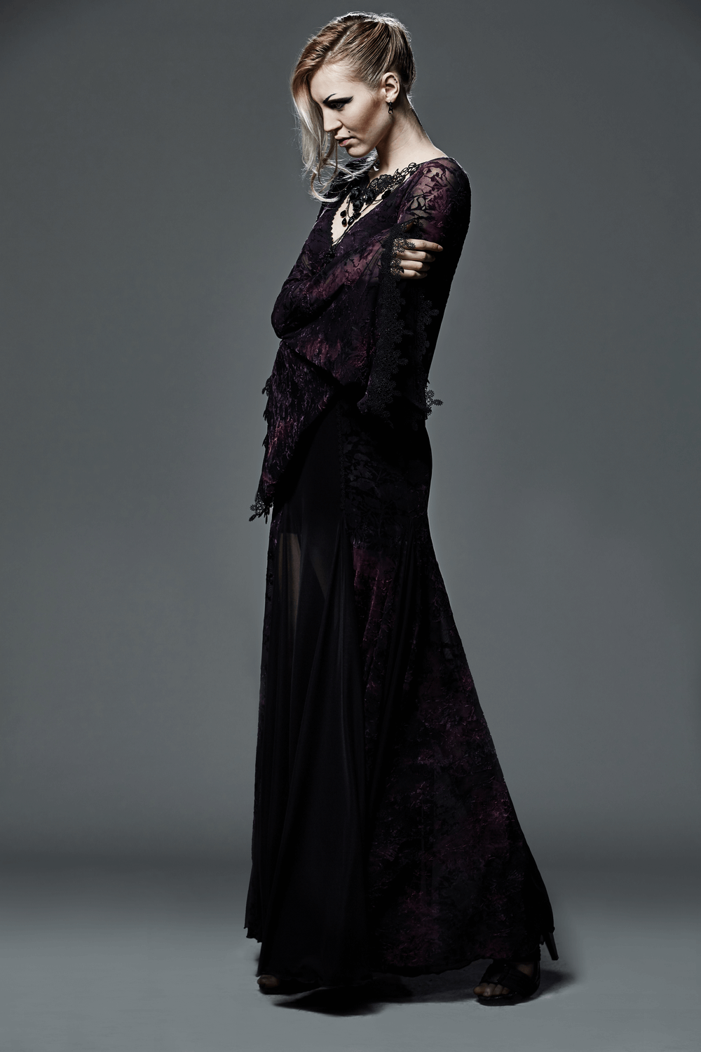 Alt Tag: Gothic Lace Bell Sleeved Maxi Dress and Sheer Mesh Inset purple floral lace gown, dramatic bell sleeves, embroidered front, draped cowl back